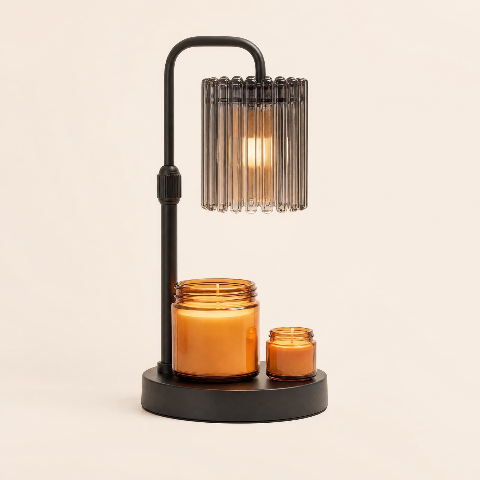A tall jar candle and a small one side by side under the raised shade, showing the clearance underneath.